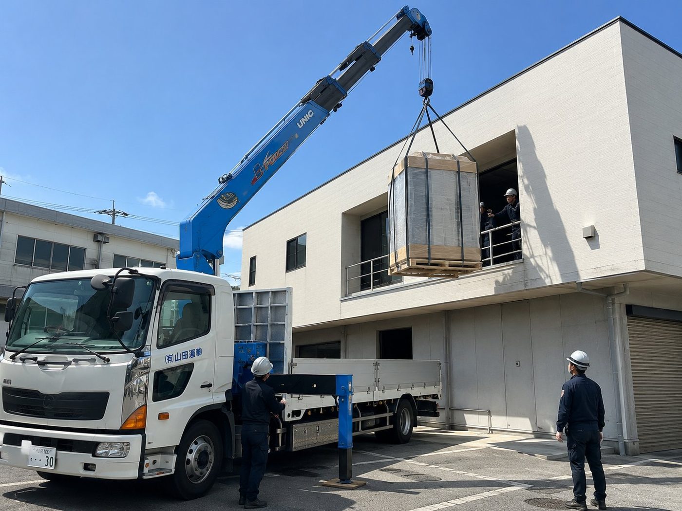 ユニック車による大型品の2階搬入